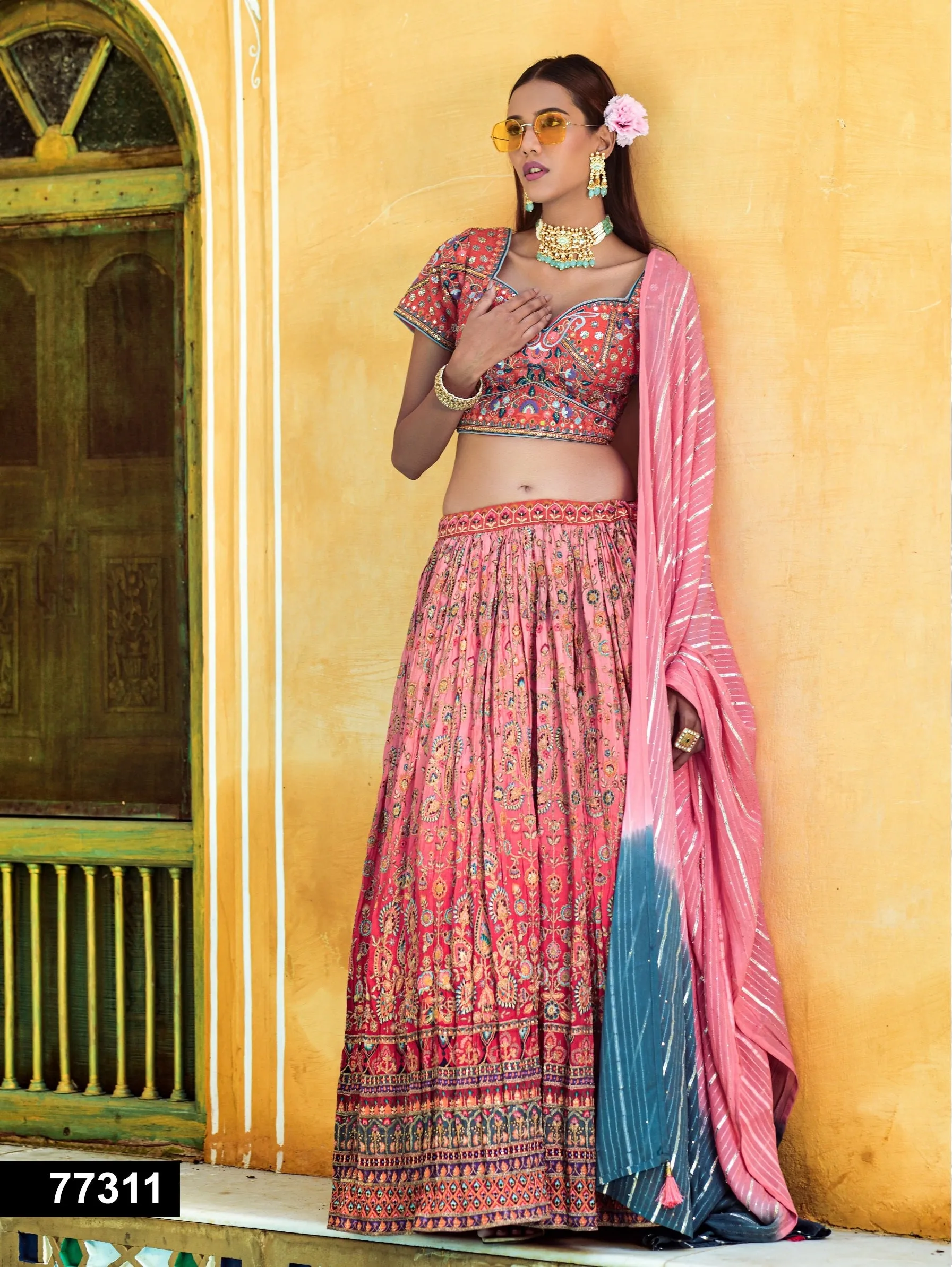 Carrot Red colored heavy embroidered Lehenga Set - Rent