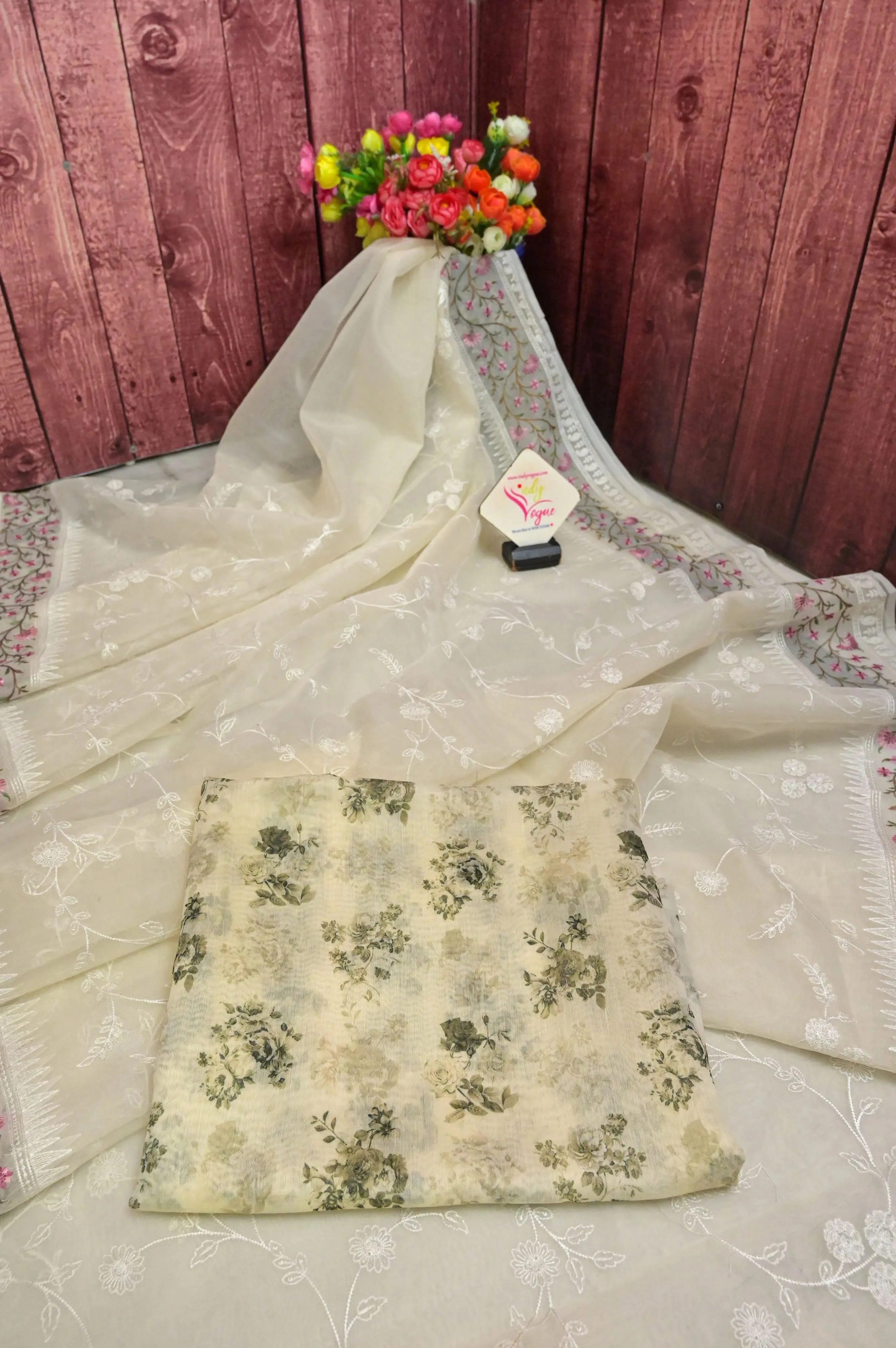 Cream Color Organza Saree with Machine Embroidery and Jaal Work