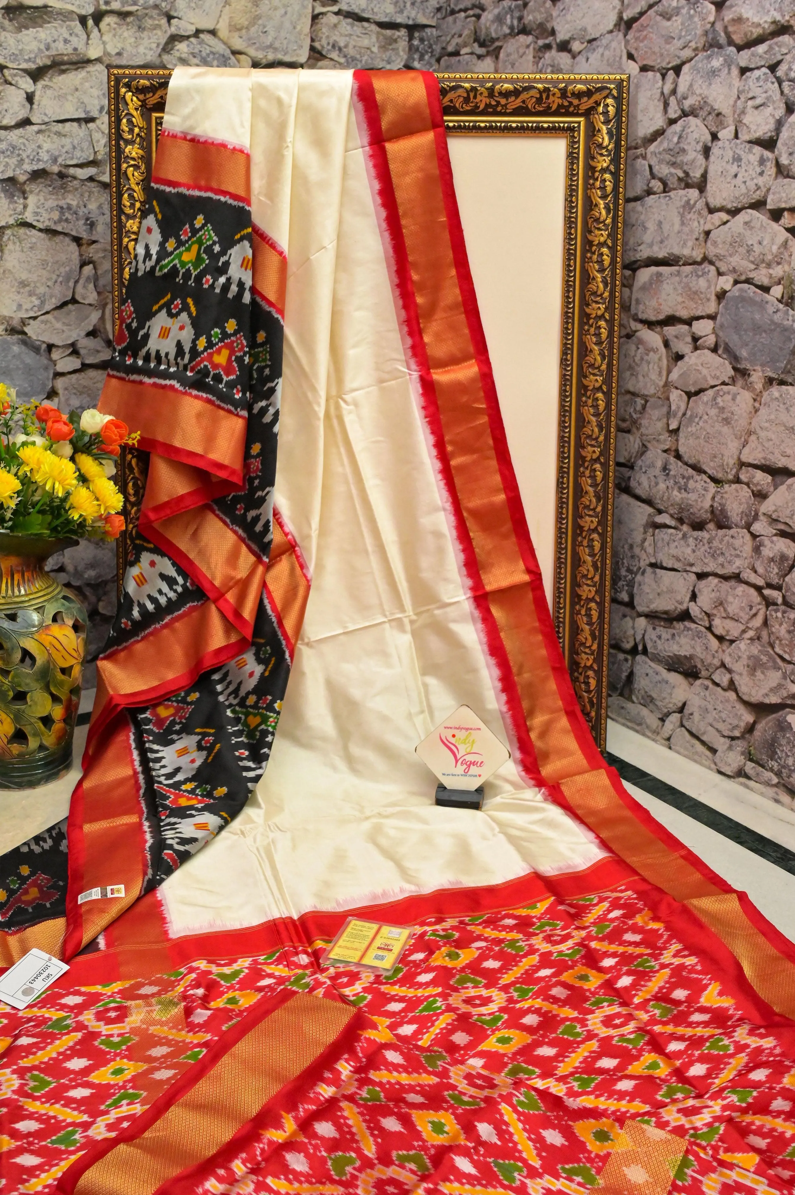 Deep Offwhite Color Ikat Patola Silk Saree with One-Sided Broad Border