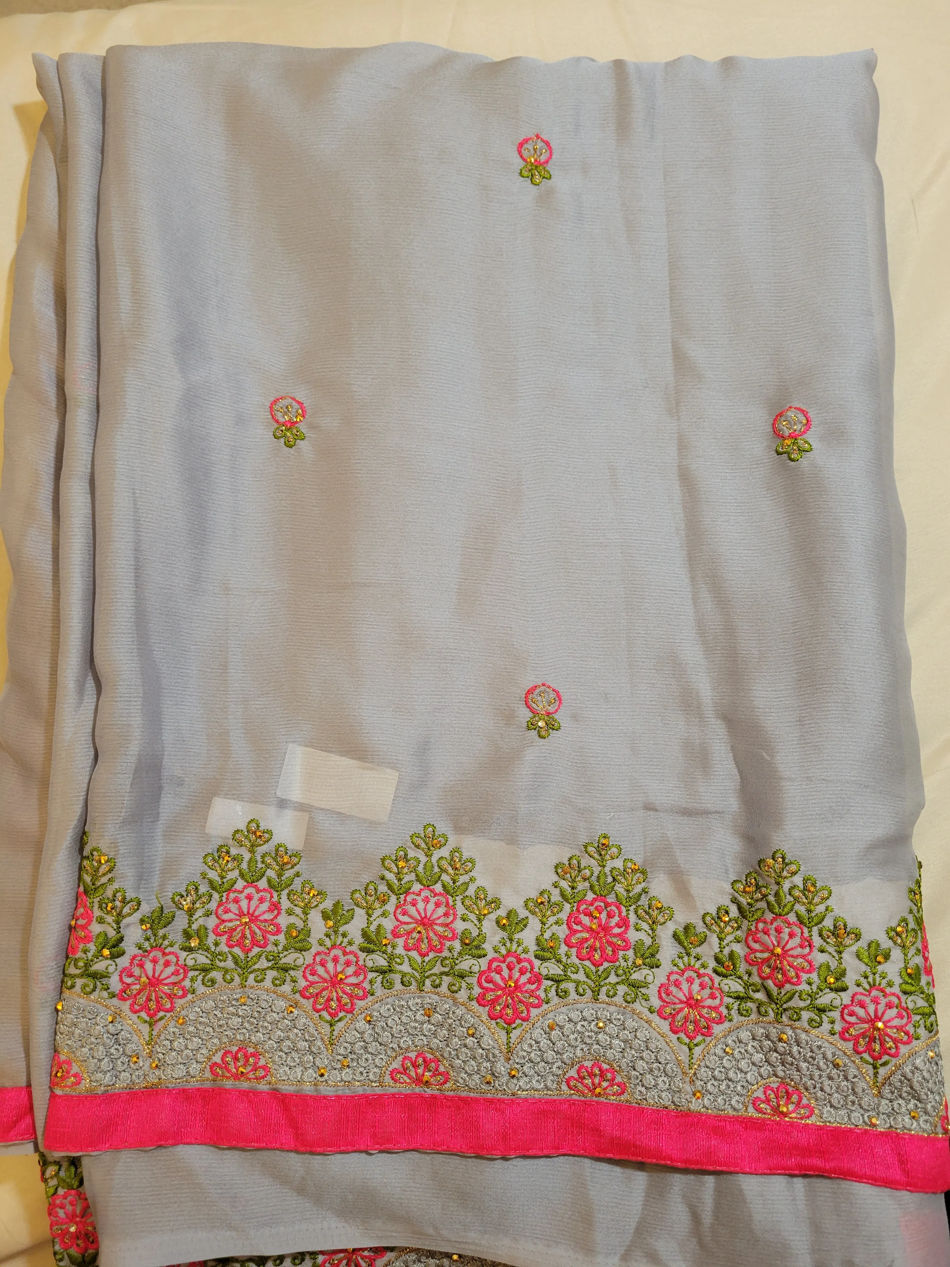 Grey Color Embroidery Georgette Saree With Contrast Pink Lace Border