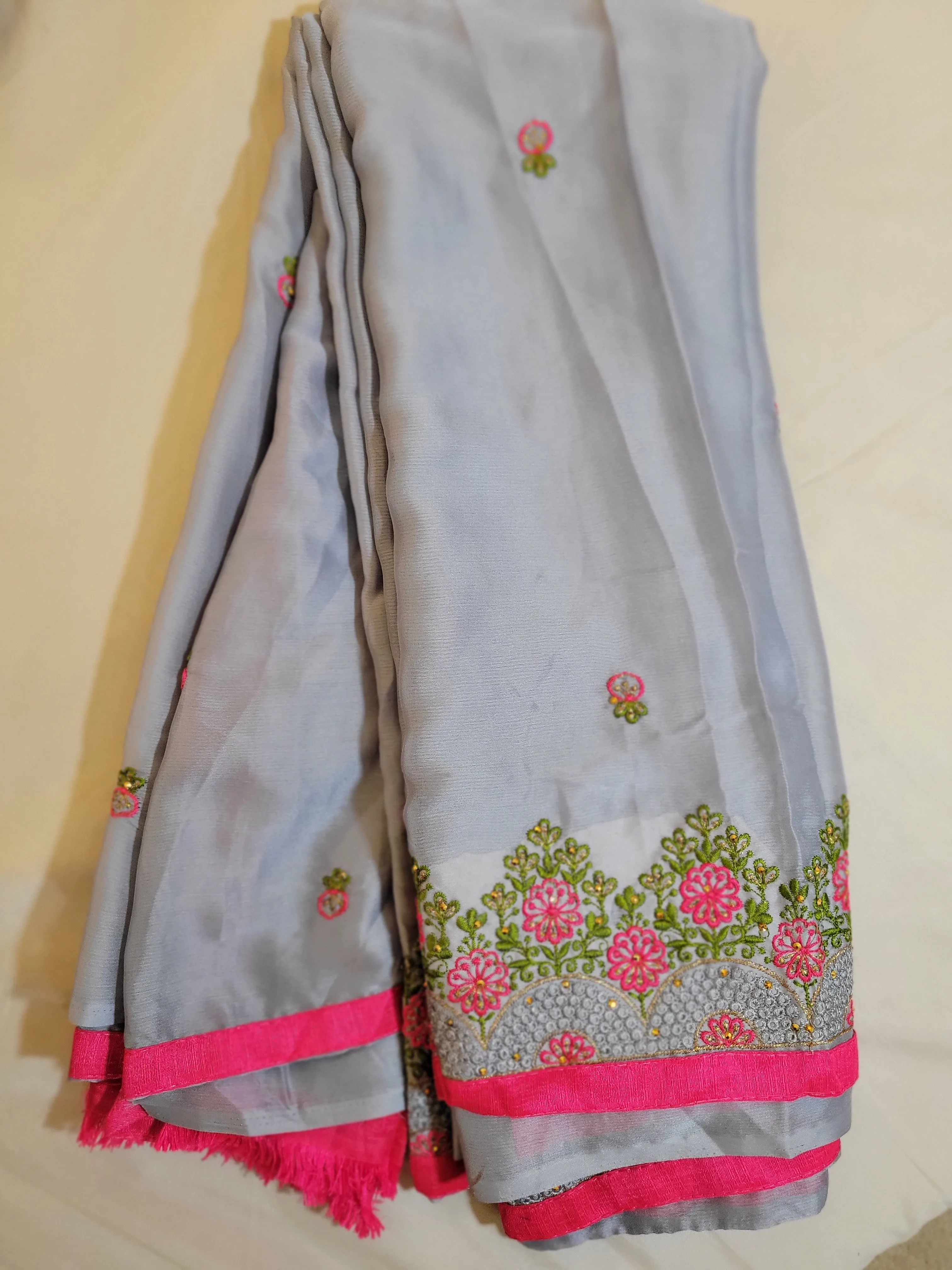 Grey Color Embroidery Georgette Saree With Contrast Pink Lace Border